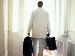 Kathbern Management - Toronto Recruitment Agency - A person with bags packed walking out a door