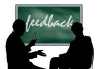 A Person Giving Another Person Feedback - Kathbern Management Toronto Recruiting Agency