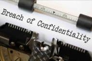 A Typed Page on a Typewriter That Reads Breach of Confidentiality - Kathbern Management Toronto Recruiting Agency