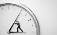 A Man Pushing the Hands of a Clock - Kathbern Management Toronto recruiting agency