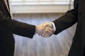 Two Businessmen Shaking Hands - Kathbern Management Toronto Recruiting Firm