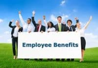 Employees Holding a Sign Reading Employee Benefits - Kathbern Management Toronto Recruitment Agency