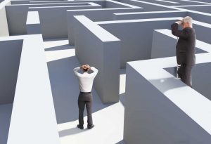 Leaders Overlooking A Person Trapped In A Maze - Kathbern Management Toronto Recruiting Agency