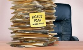 A Stack Of Papers Labelled Bonus Program Do Not Touch - Kathbern Management Toronto Recruiting Firm