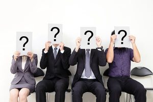 Potential Candidates for Unfilled Positions Sitting With Question Marks Over Faces - Kathbern Management Toronto Executive Headhunters